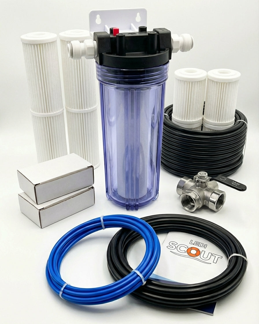 Collection of water filtration components including a blue filter housing, hoses, and accessories on a white background.